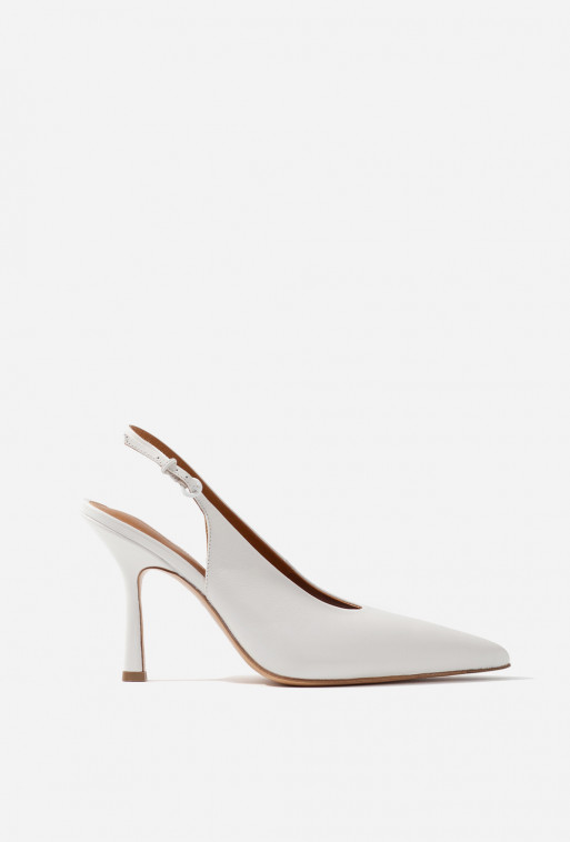 Roomy white patent leather slingback shoes