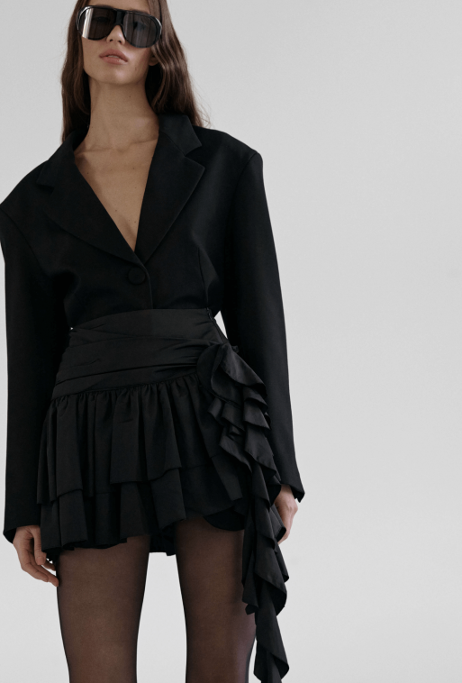 Black mini skirt with drape