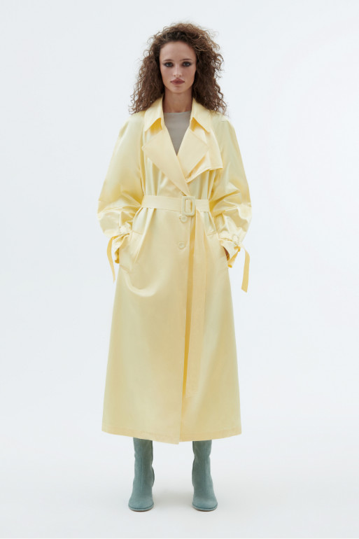 Pastel yellow trench coat