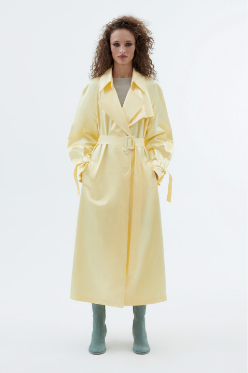 Pastel yellow trench coat