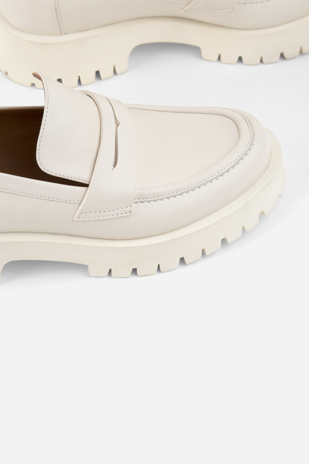 Penny milky leather
loafers