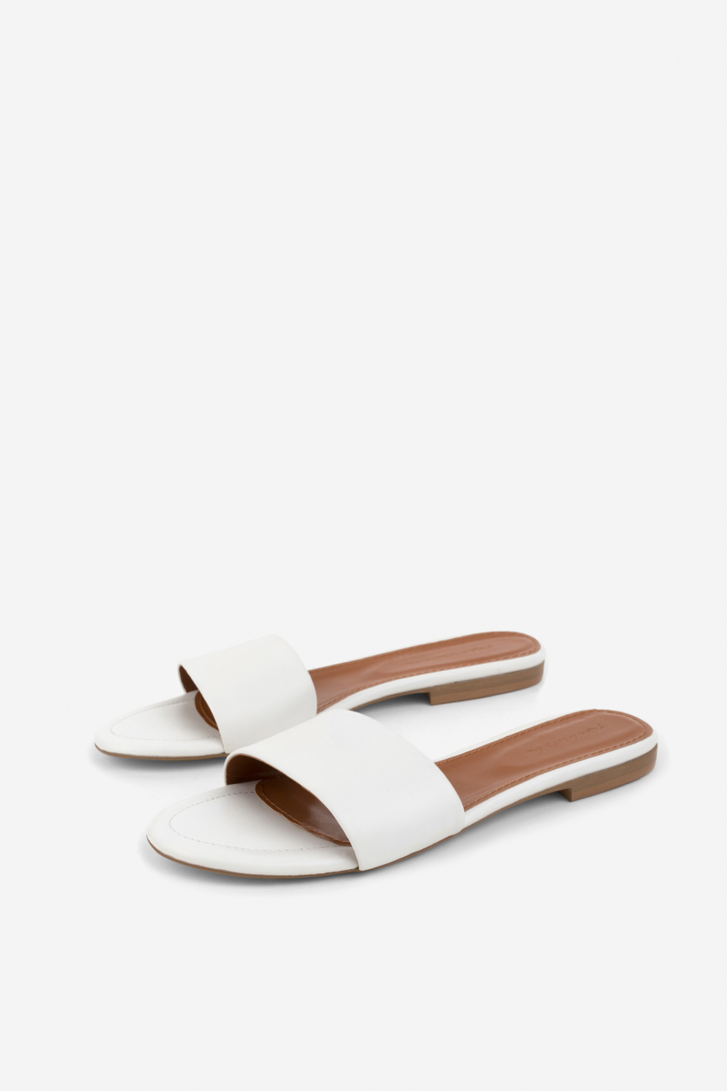 Reese white leather
sandals