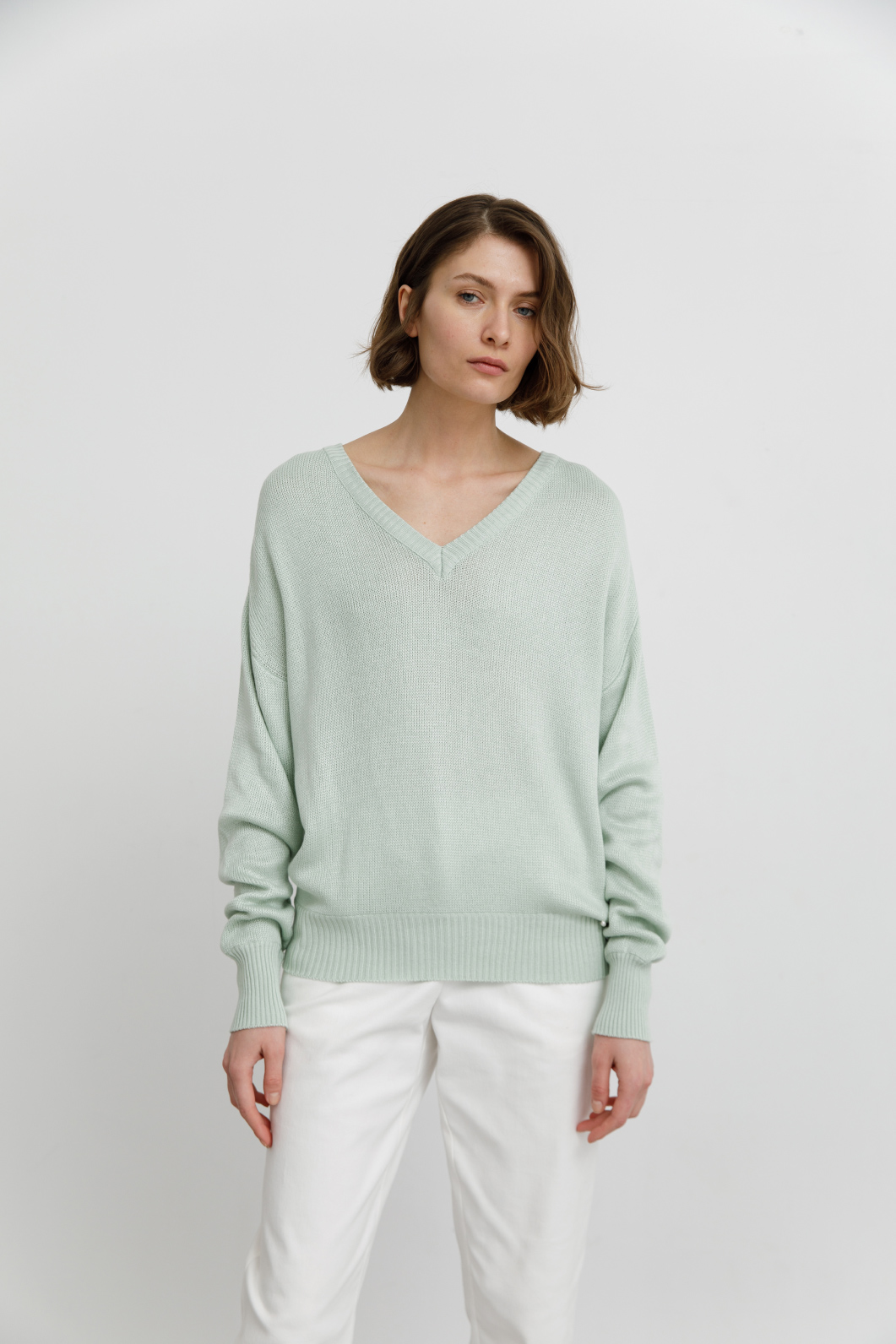 Трикотажний светр Tommy
м`ятного кольору