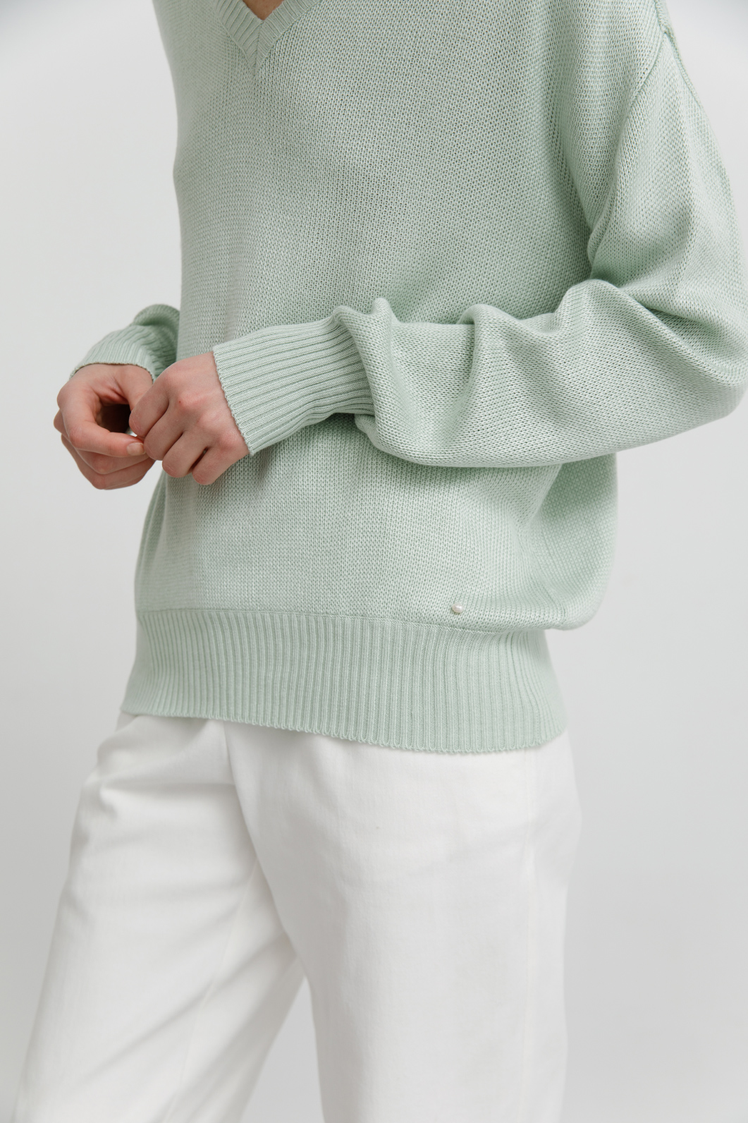 Трикотажний светр Tommy
м`ятного кольору