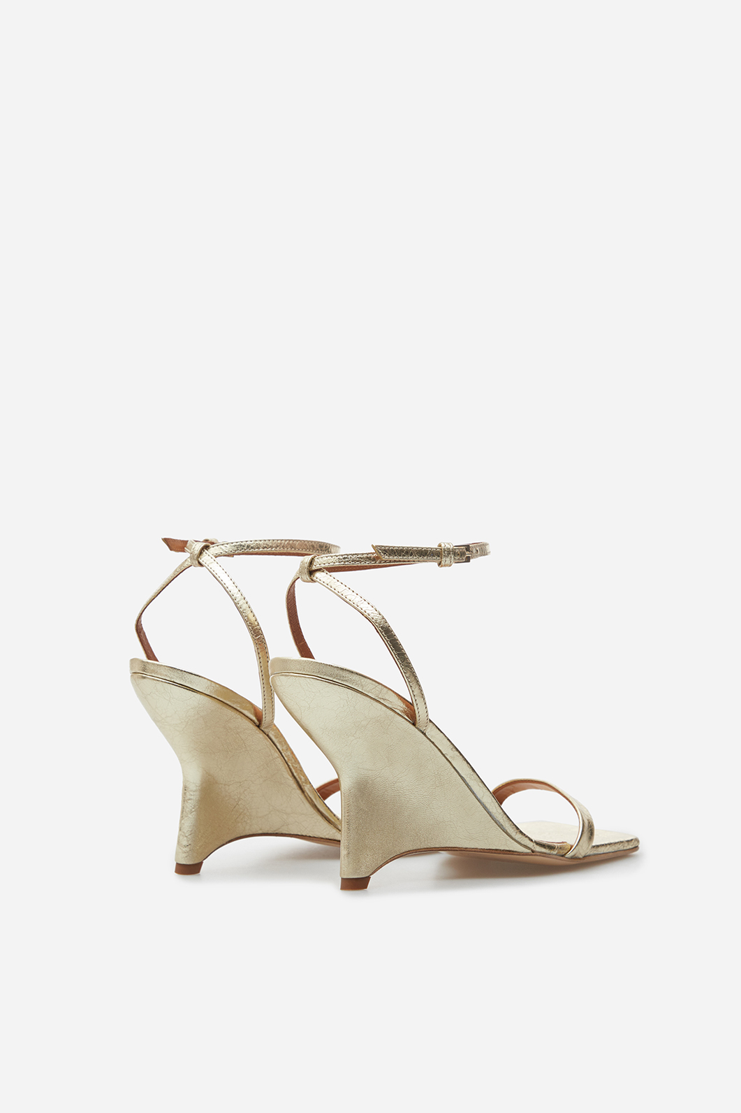 Isa gold leather
sandals