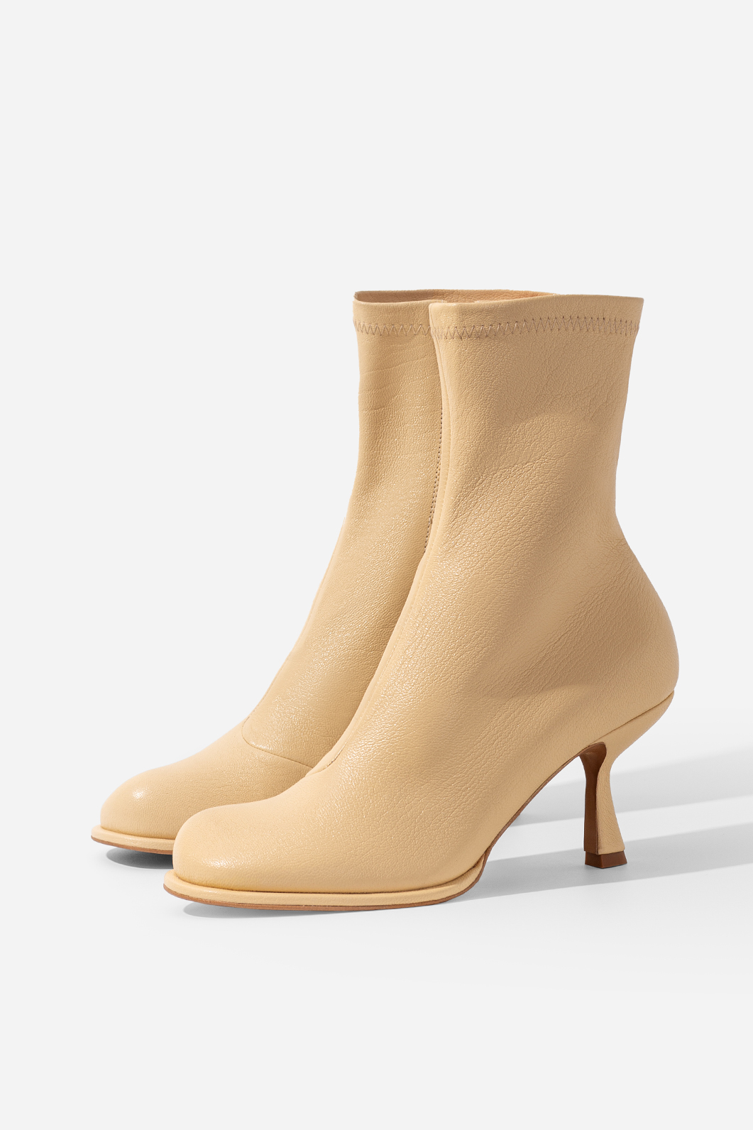 Blanca beige leather ankle boots