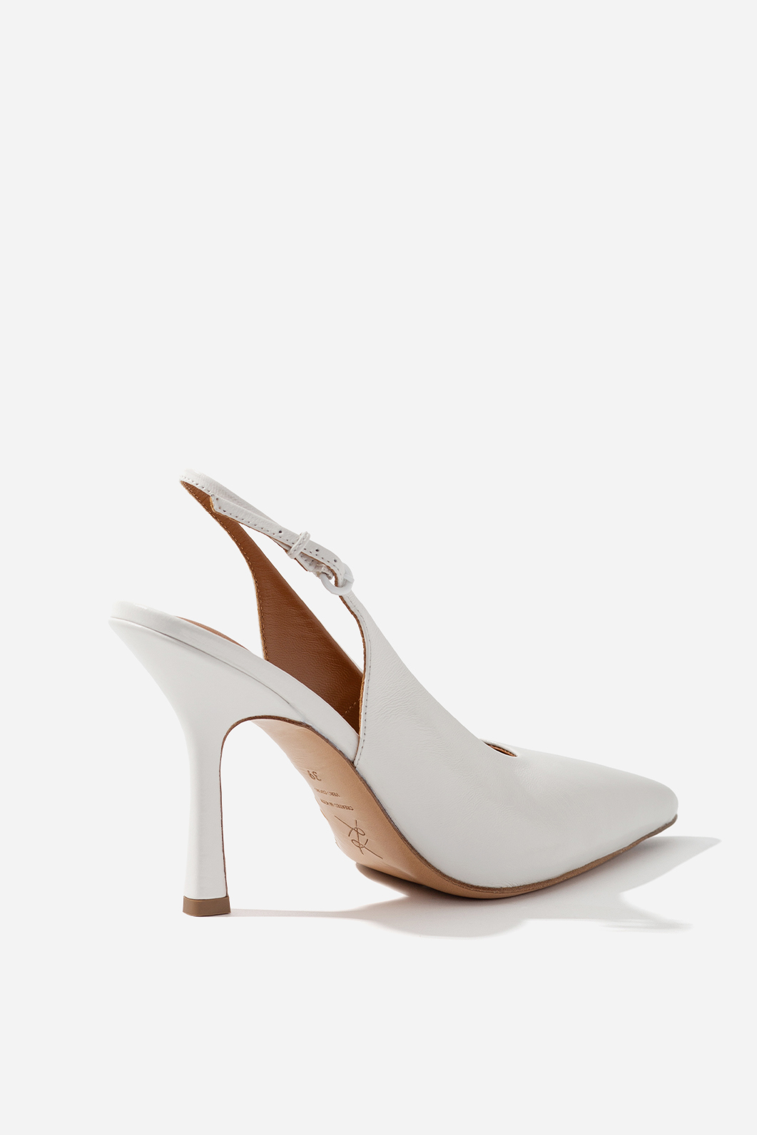 Roomy white patent leather slingback shoes