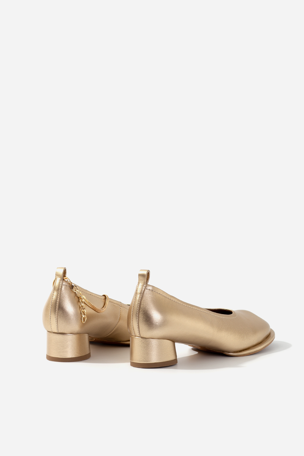 NATALIE gold pumps