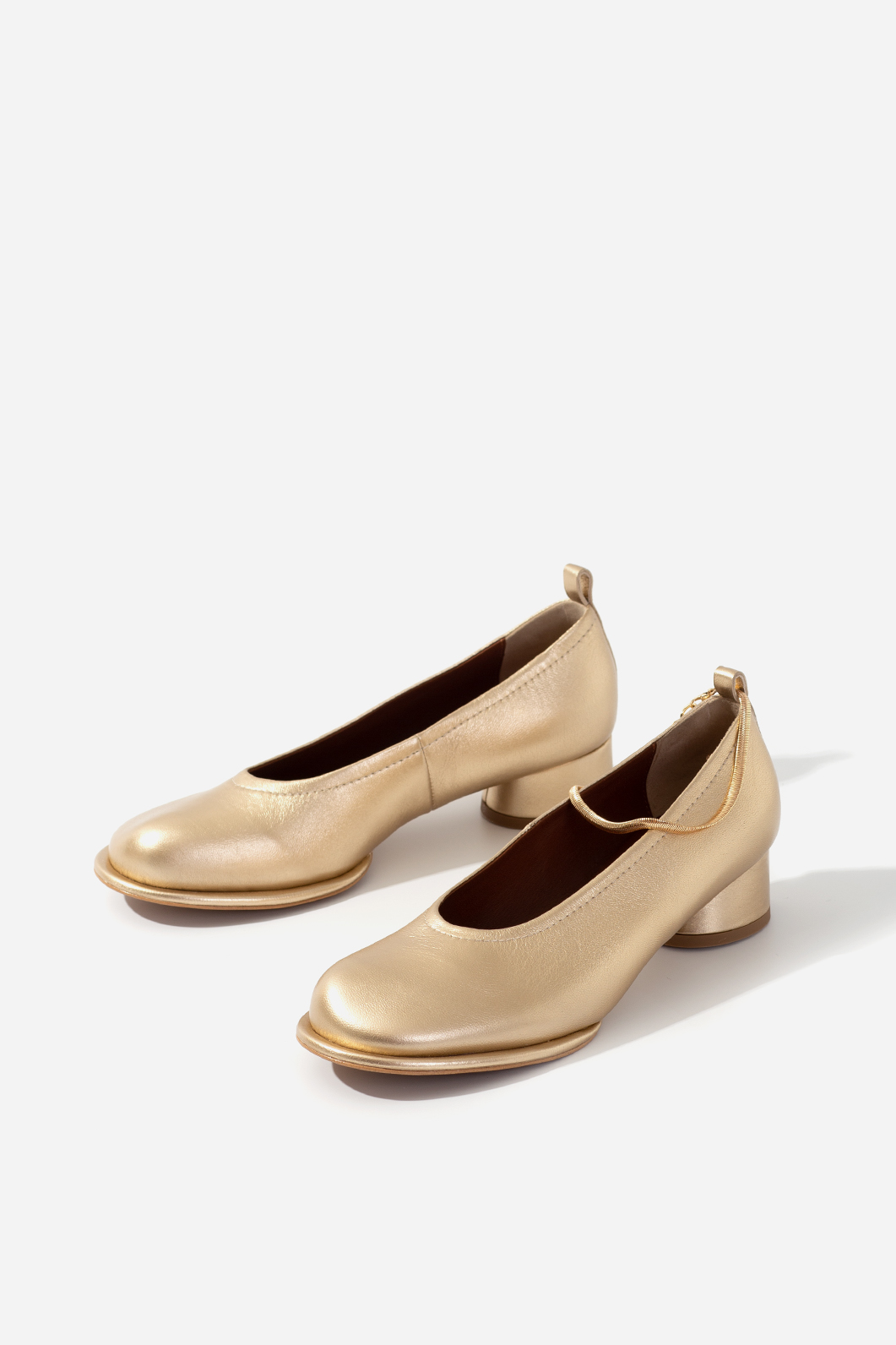 NATALIE gold pumps